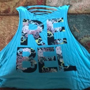 Blue tank top that’s ripped on the back